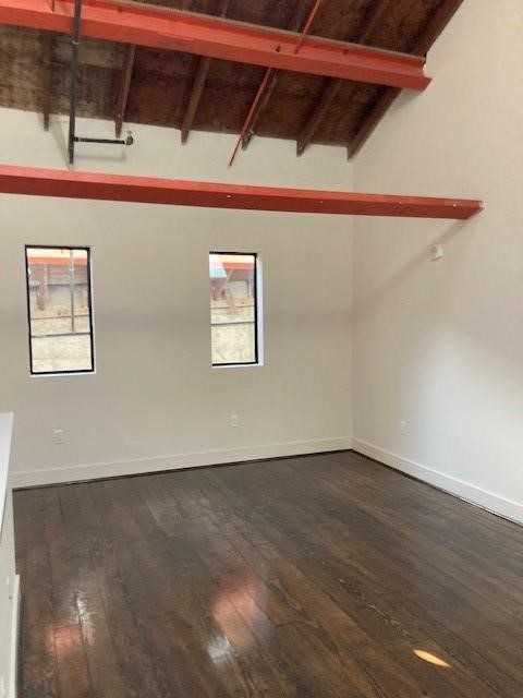 4411 Dallas Street, Unit 44 Houston, TX 77023 - Photo 4 of 16 a view of a room with wooden floor and windows