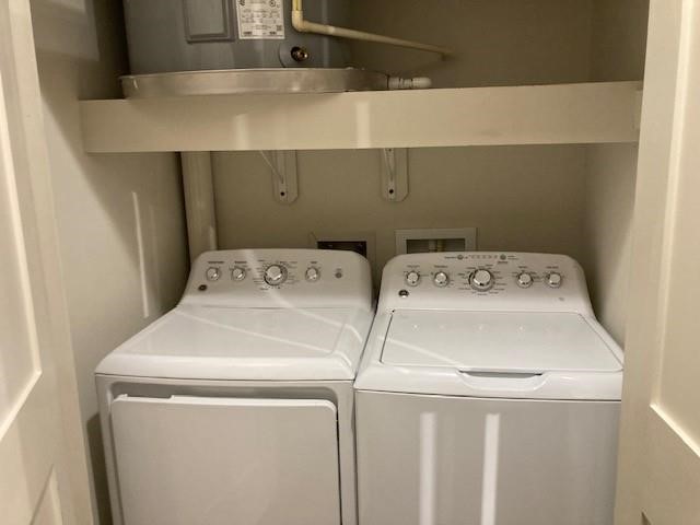 4411 Dallas Street, Unit 44 Houston, TX 77023 - Photo 8 of 16 a utility room with dryer and washer