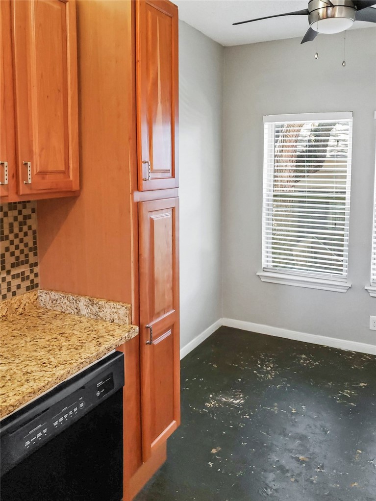 2414 Longview Street, Unit 206 Austin, TX 78705 - Photo 7 of 17 a view of a kitchen with wooden floor and staircase