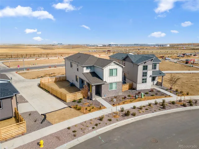 a view of a city with an ocean