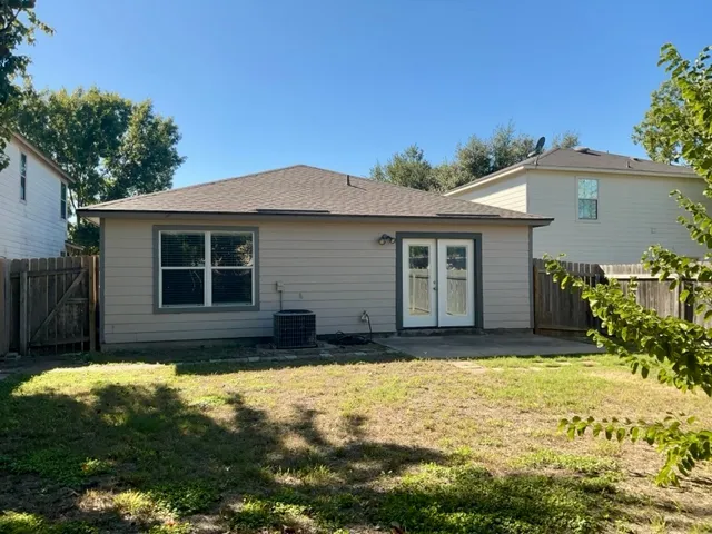 a house view with a garden space