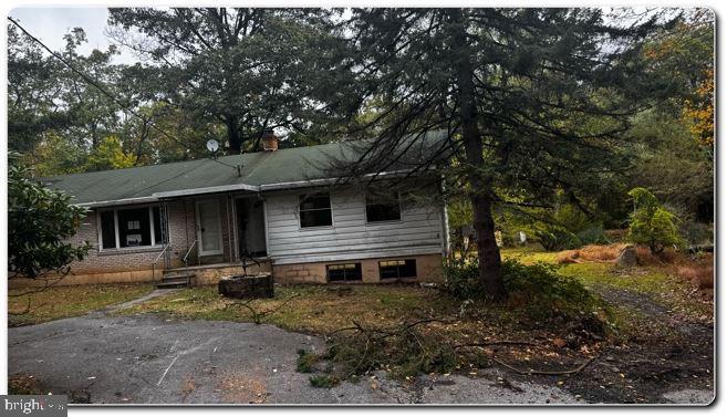 4759 Sheeprock Road Macungie, PA 18062 - Photo 19 of 24 a front view of a house with garden