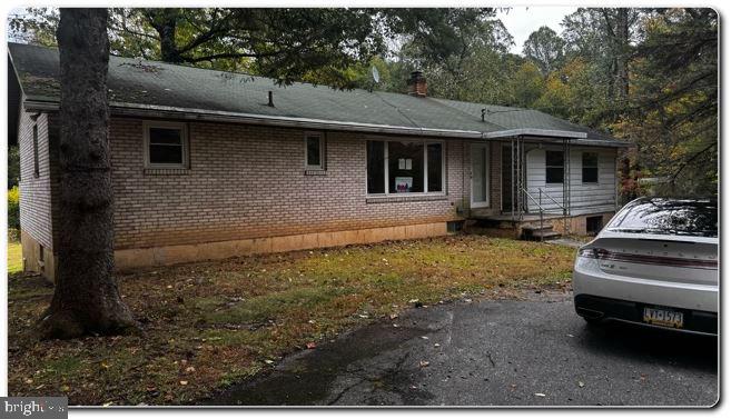 4759 Sheeprock Road Macungie, PA 18062 - Photo 24 of 24 a backyard of a house with barbeque oven