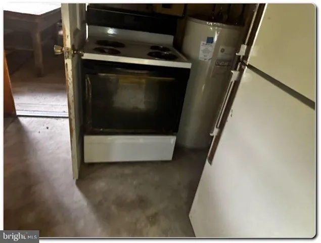 a utility room with washer and dryer