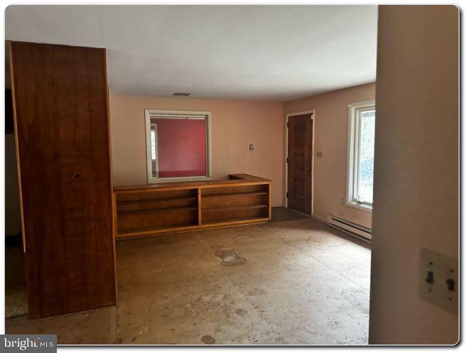 4759 Sheeprock Road Macungie, PA 18062 - Photo 9 of 24 a view of room with a flat tv screen and a dresser