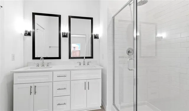 a bedroom with bed and a window