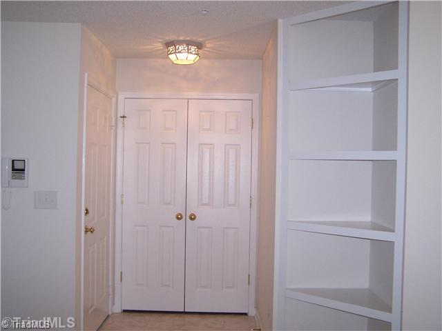 125 James High Point, Unit 1B High Point, NC 27265 - Photo 5 of 16 Entry. Entry from the common area. Phone system allows guests to ring you and you can see who it is before buzzing them in.