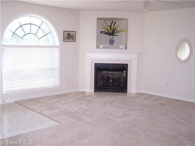 125 James High Point, Unit 1B High Point, NC 27265 - Photo 7 of 16 Living Room. Living area with fireplace.
