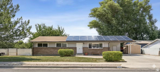 495 North 250 West Springville, UT 84663 - Photo 1 of 35 Ranch-style residence featuring solar panels, a partial brick facade, and a covered carport