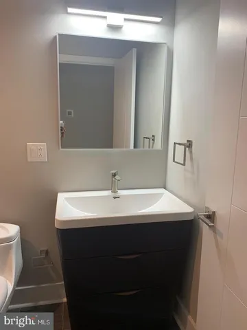 a bathroom with a sink and a toilet