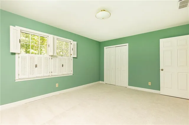 a view of a room with a large window