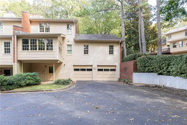 a view of a house with a street