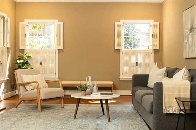 a living room with furniture and a window