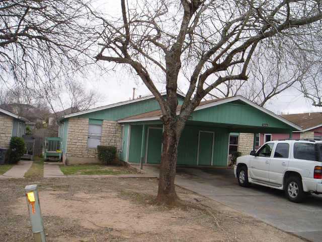 5603 Spring Meadow Road Austin, TX 78744 - Photo 1 of 1 a view of a car park in front of house