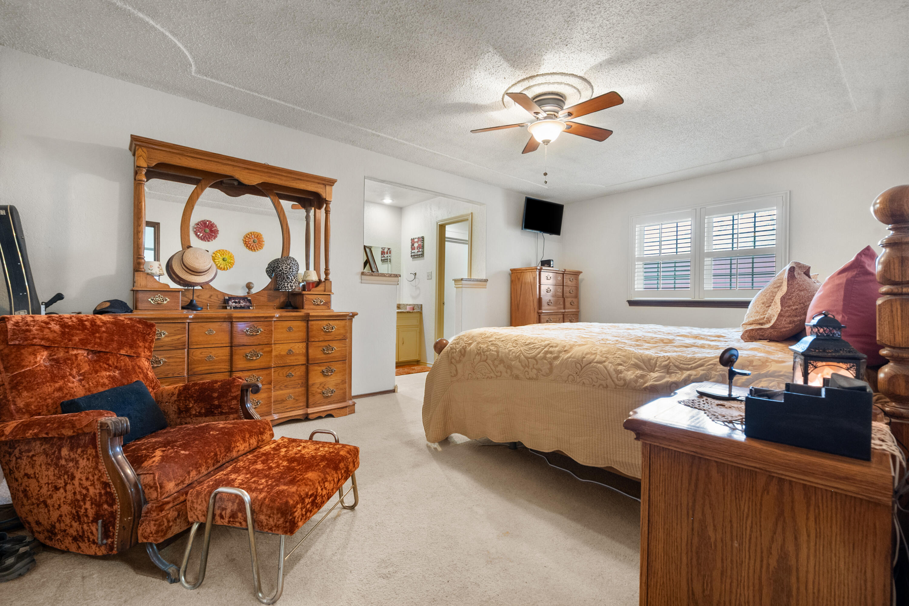 4610 63rd Street Lubbock, TX 79414 - Photo 20 of 30 a bedroom with bed and window