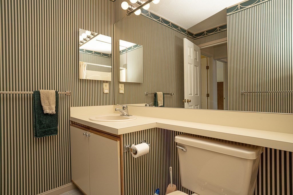 700 Shore Drive, Unit 511 Fall River, MA 02721 - Photo 14 of 40 a kitchen with a sink cabinets and a window