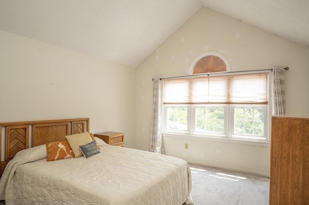 700 Shore Drive, Unit 511 Fall River, MA 02721 - Photo 16 of 40 a bedroom with a bed and a window