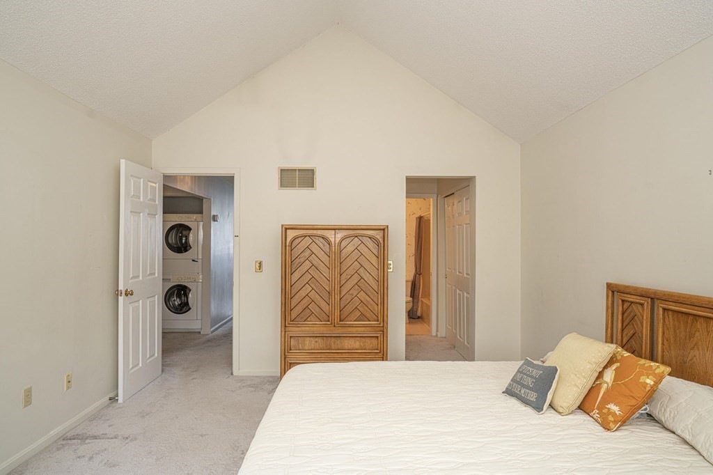 700 Shore Drive, Unit 511 Fall River, MA 02721 - Photo 17 of 40 a bedroom with a bed and a window