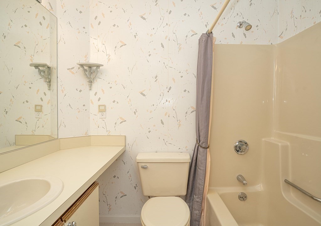 700 Shore Drive, Unit 511 Fall River, MA 02721 - Photo 19 of 40 a bathroom with a sink a toilet and shower