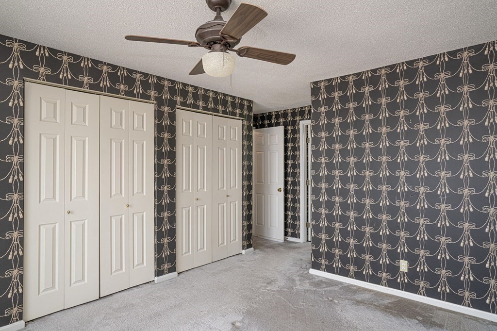 700 Shore Drive, Unit 511 Fall River, MA 02721 - Photo 23 of 40 a view of empty room with a ceiling fan and window