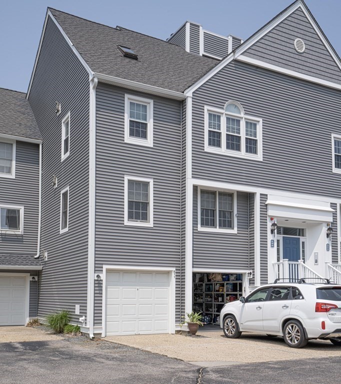 700 Shore Drive, Unit 511 Fall River, MA 02721 - Photo 29 of 40 a car parked in front of a house