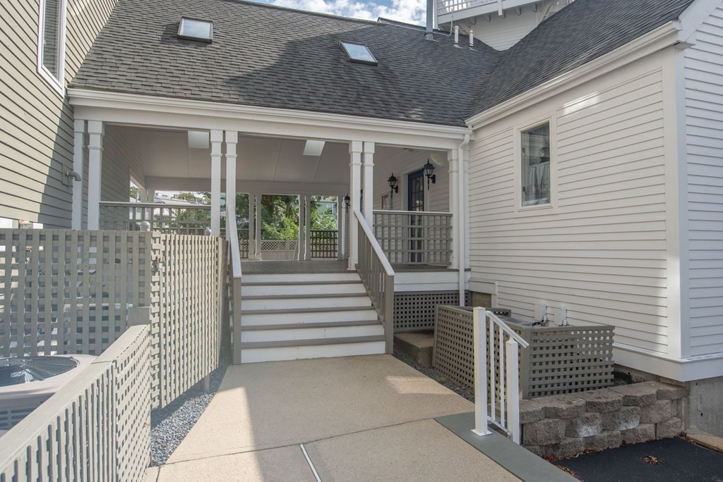 700 Shore Drive, Unit 511 Fall River, MA 02721 - Photo 38 of 40 a view of a house with stairs and a floor to ceiling window