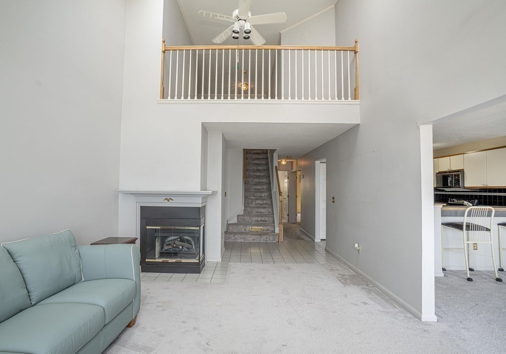 700 Shore Drive, Unit 511 Fall River, MA 02721 - Photo 6 of 40 a view of livingroom with furniture and fireplace