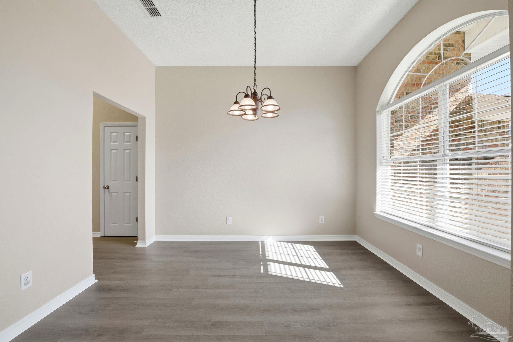 1844 Wareham Way Cantonment, FL 32533 - Photo 17 of 47 a view of a livingroom with a window