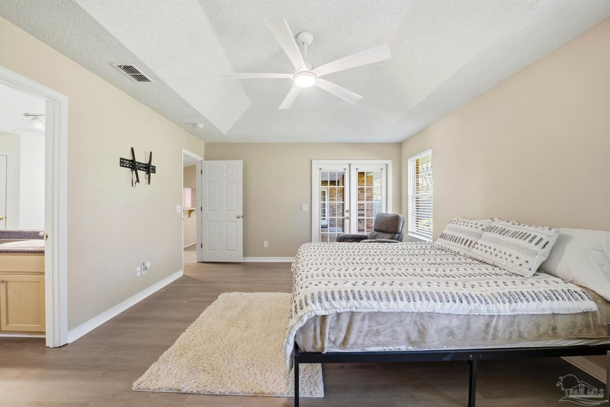 1844 Wareham Way Cantonment, FL 32533 - Photo 23 of 47 a bedroom with a bed and window