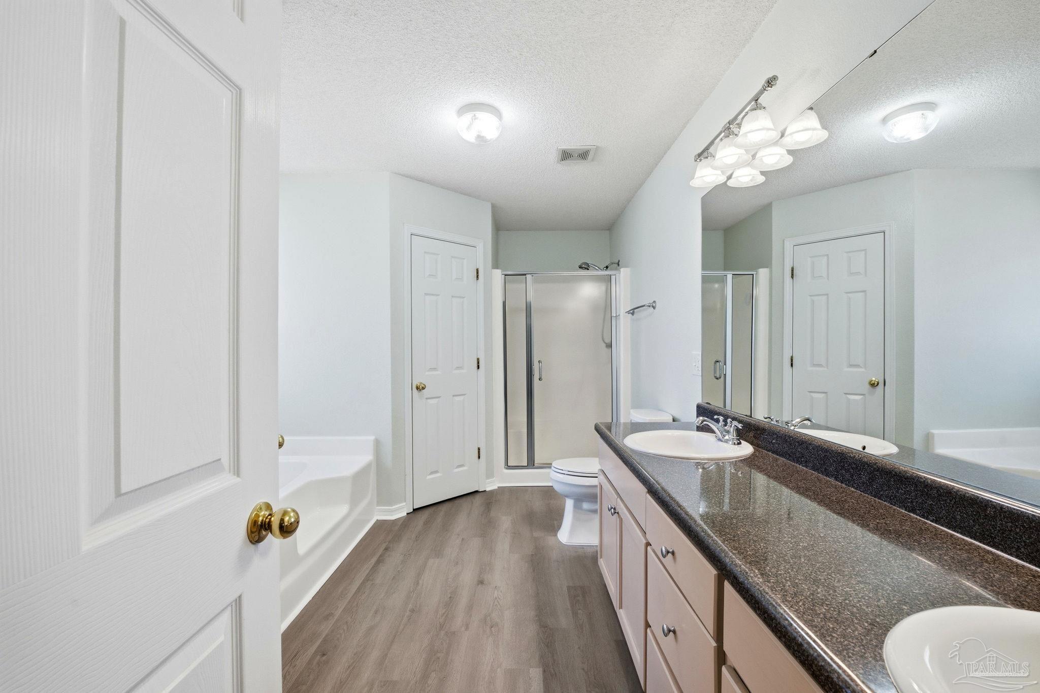 1844 Wareham Way Cantonment, FL 32533 - Photo 25 of 47 a hallway with granite countertop furniture and chandelier
