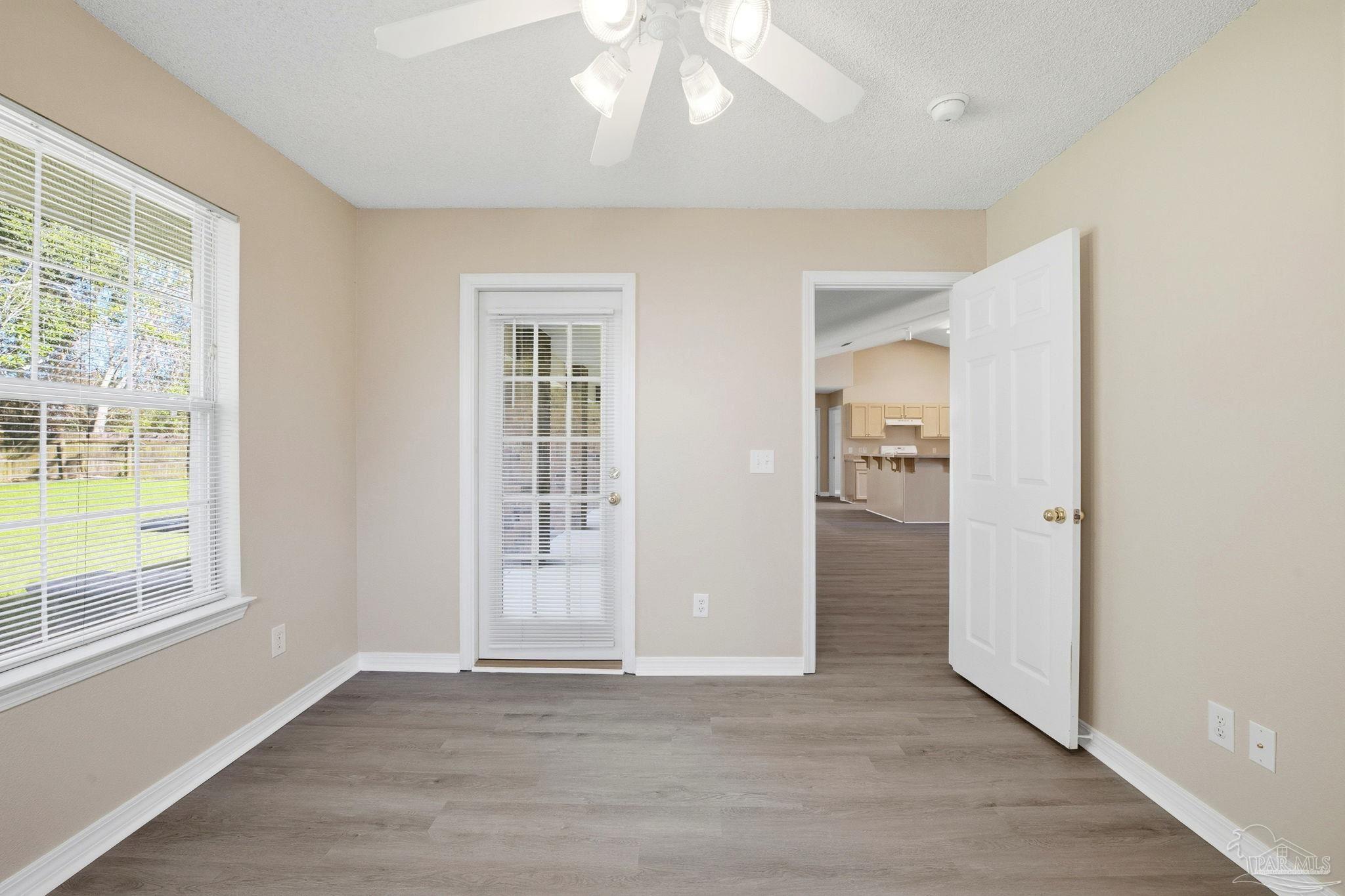 1844 Wareham Way Cantonment, FL 32533 - Photo 31 of 47 an empty room with windows and closet