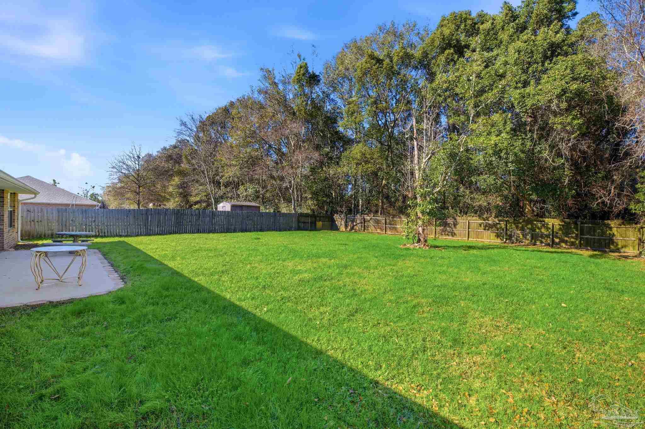 1844 Wareham Way Cantonment, FL 32533 - Photo 45 of 47 a view of yard with grass and trees