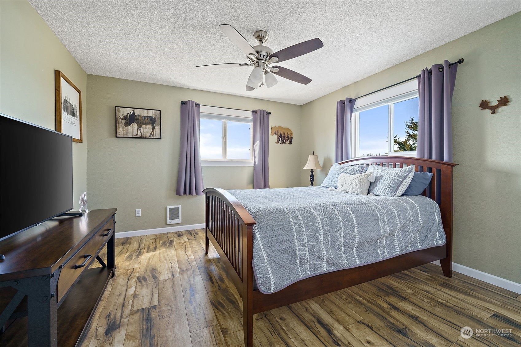 1880 Birch Bay Lynden Road Ferndale, WA 98248 - Photo 21 of 33 a bedroom with a bed and wooden floor