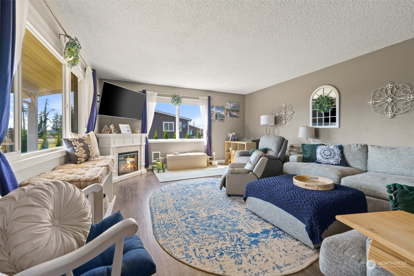 1880 Birch Bay Lynden Road Ferndale, WA 98248 - Photo 8 of 33 a living room with furniture flat screen tv and a large window