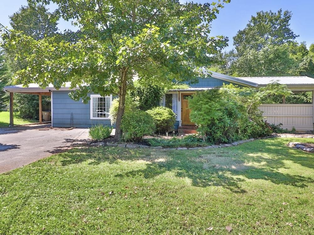 3201 Walnoaks Road Knoxville, TN 37921 - Photo 1 of 24 front view of a house with a yard