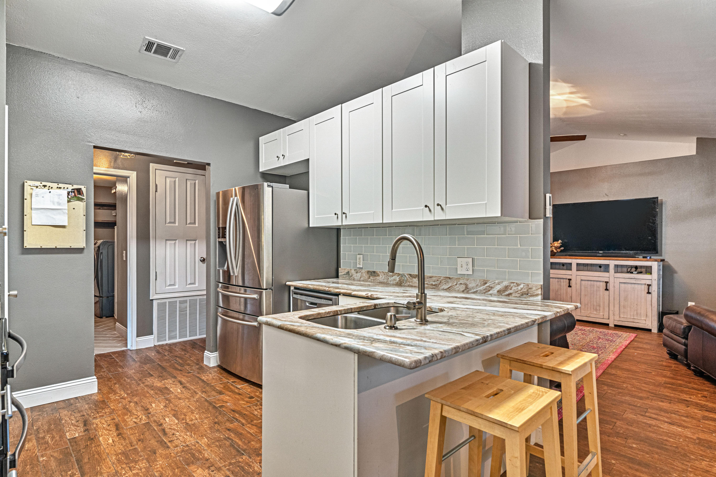 2813 Atoka Trail Crestview, FL 32539 - Photo 21 of 29 a kitchen with stainless steel appliances granite countertop a sink refrigerator and microwave