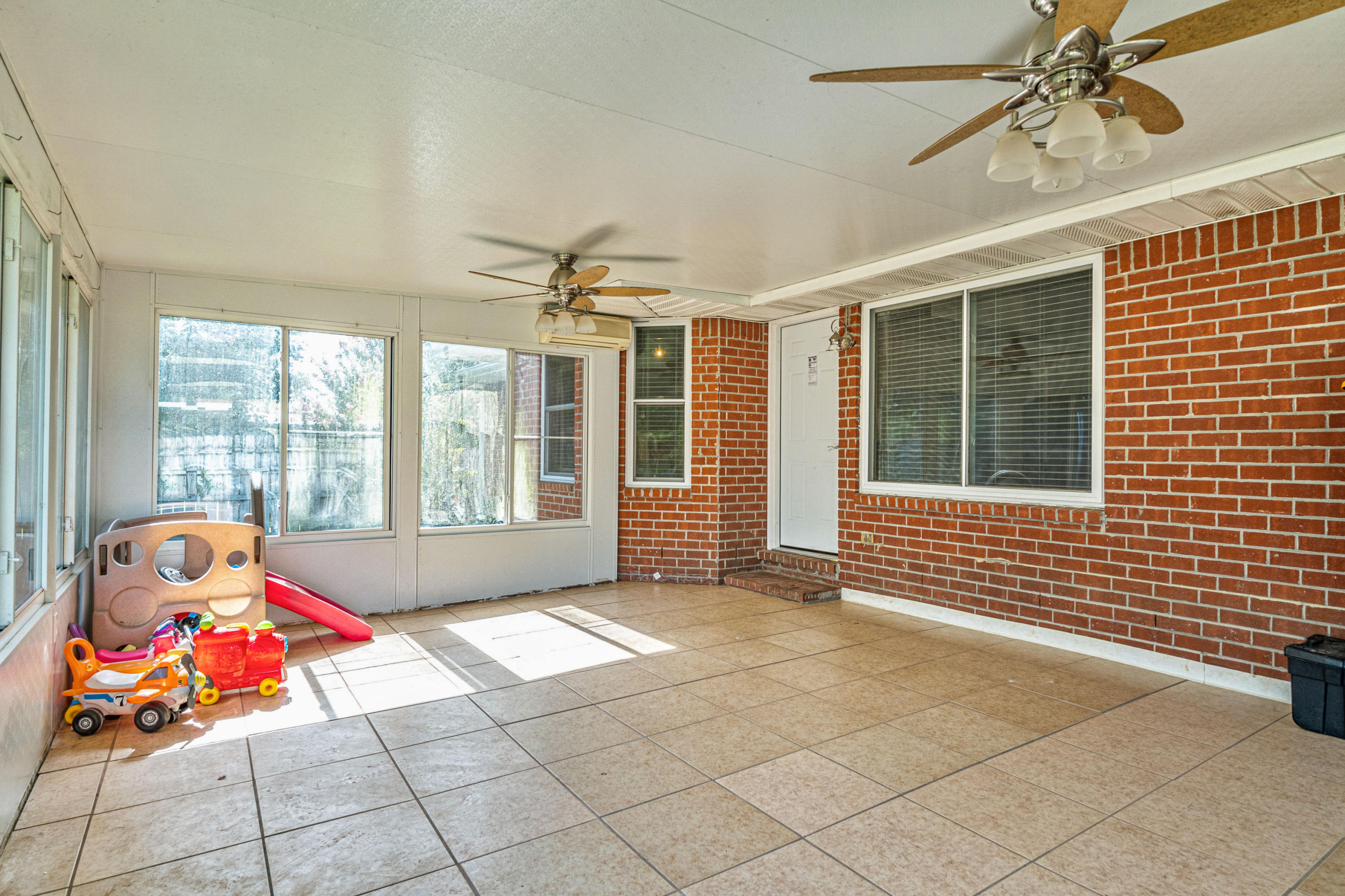 2813 Atoka Trail Crestview, FL 32539 - Photo 26 of 29 a living room with a large window