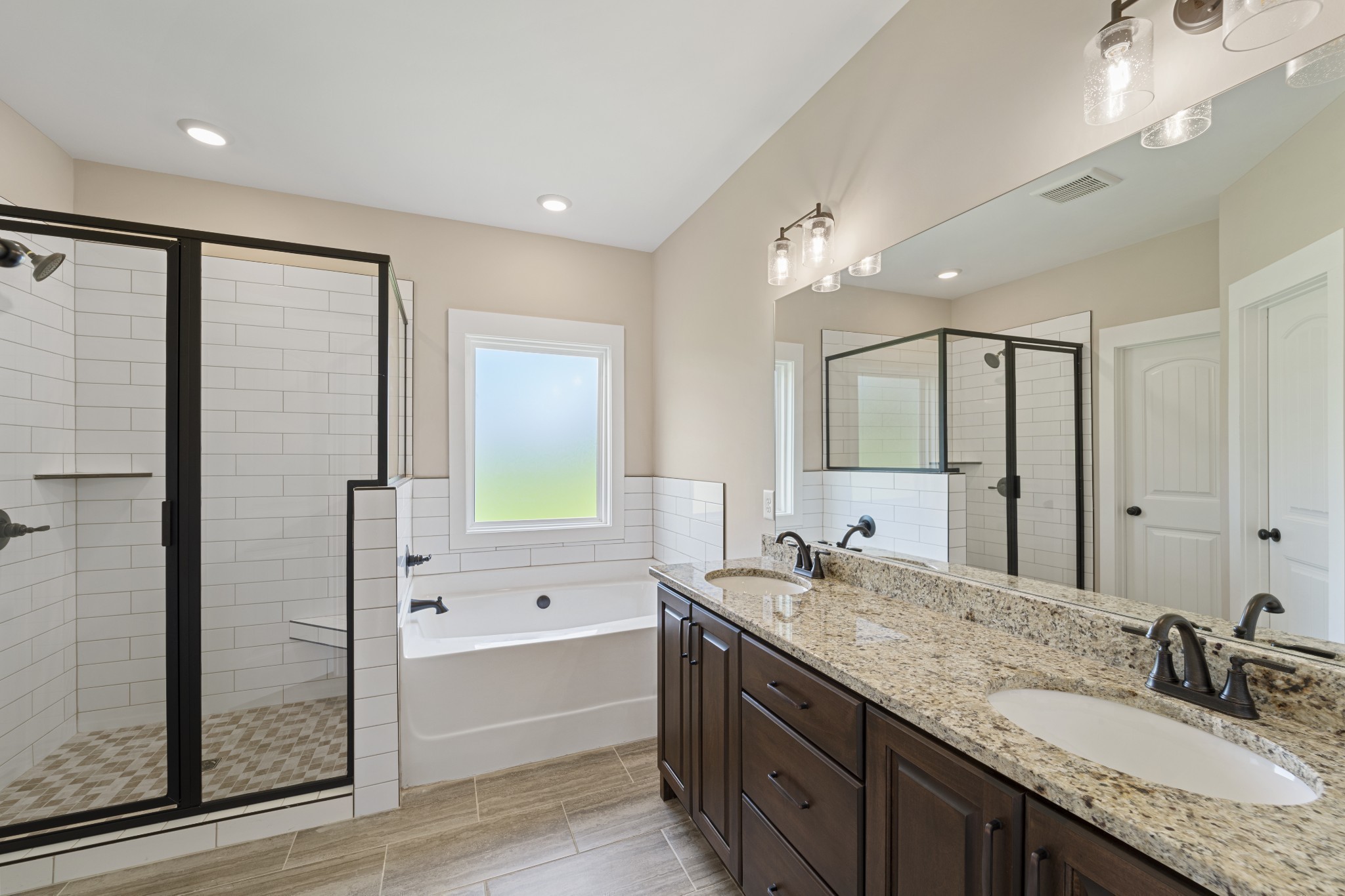 541 Clearview Road Cottontown, TN 37048 - Photo 11 of 18 a bathroom with a granite countertop sink mirror and a bathtub