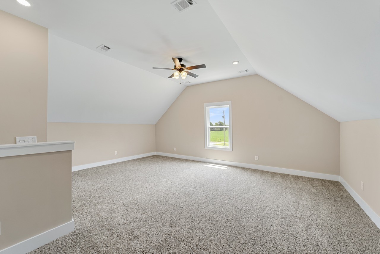 541 Clearview Road Cottontown, TN 37048 - Photo 15 of 18 an empty room with a window and a ceiling fan