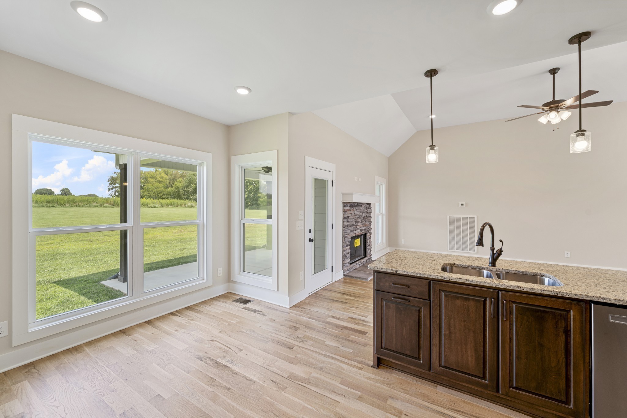 541 Clearview Road Cottontown, TN 37048 - Photo 4 of 18 a kitchen with a sink window and wooden floor