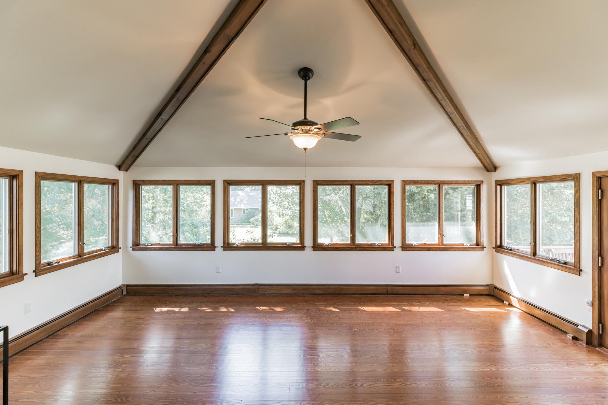 444 Shady Lane Moorestown, NJ 08057 - Photo 15 of 46 a view of empty room with wooden floor and fan