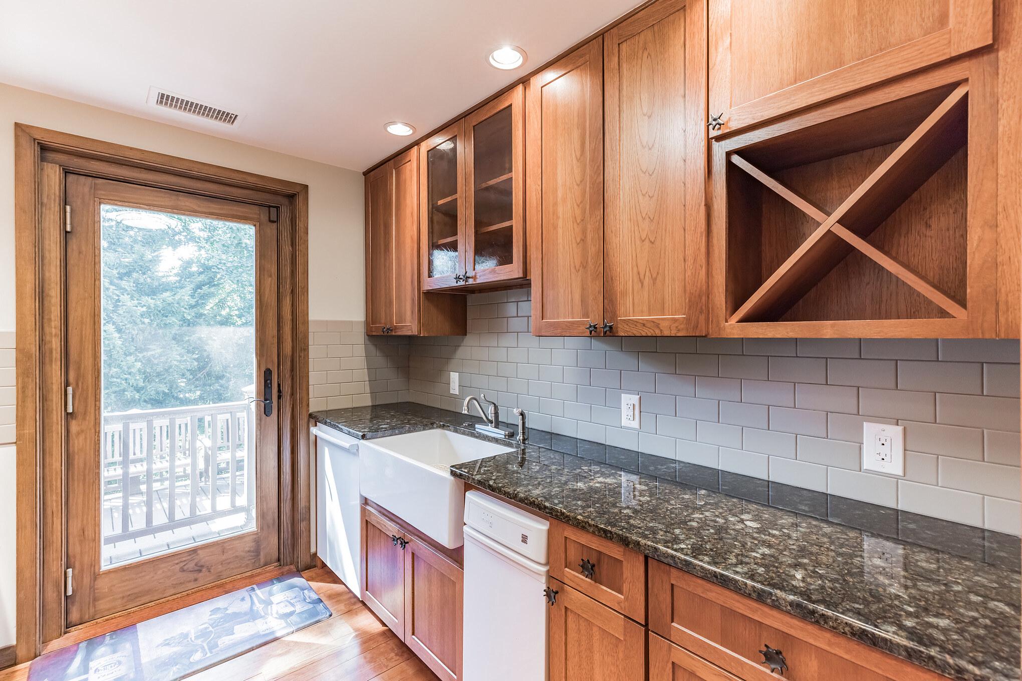 444 Shady Lane Moorestown, NJ 08057 - Photo 16 of 46 a kitchen with stainless steel appliances granite countertop a sink a stove and a microwave