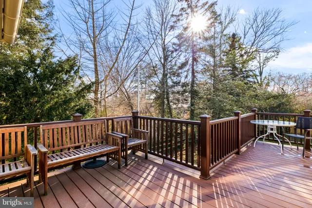 a view of deck with wooden floor and outdoor seating