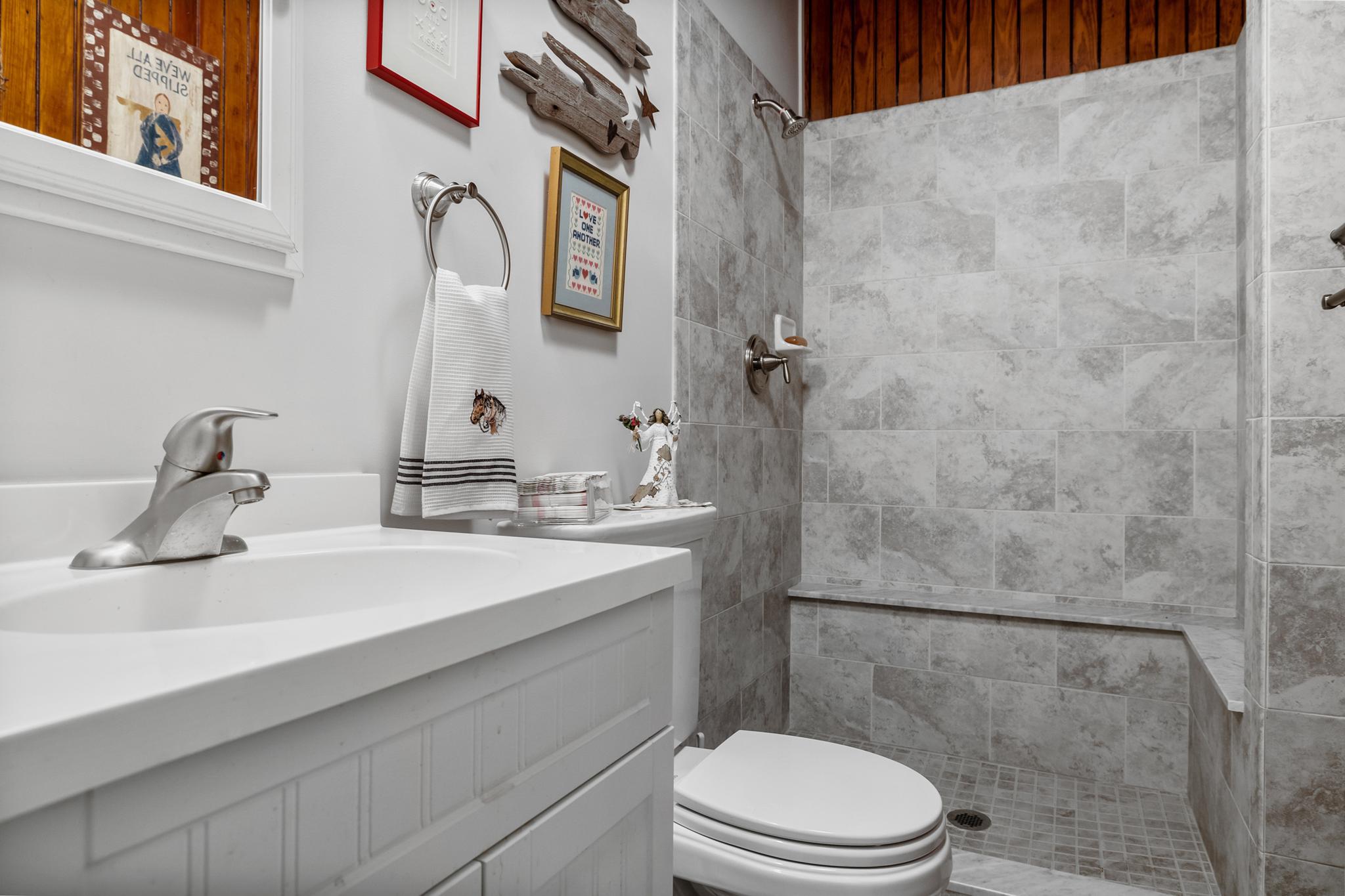 444 Shady Lane Moorestown, NJ 08057 - Photo 38 of 46 a bathroom with a sink a toilet and shower
