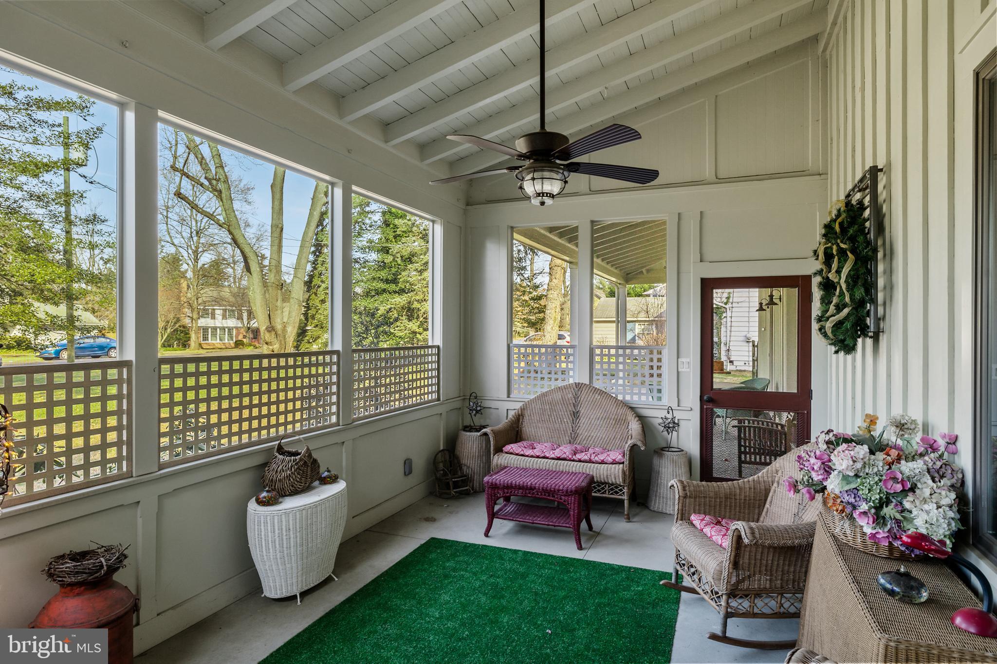 444 Shady Lane Moorestown, NJ 08057 - Photo 43 of 46 a living room with furniture and a floor to ceiling window