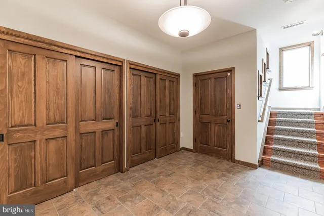 wooden floor and closet in a room