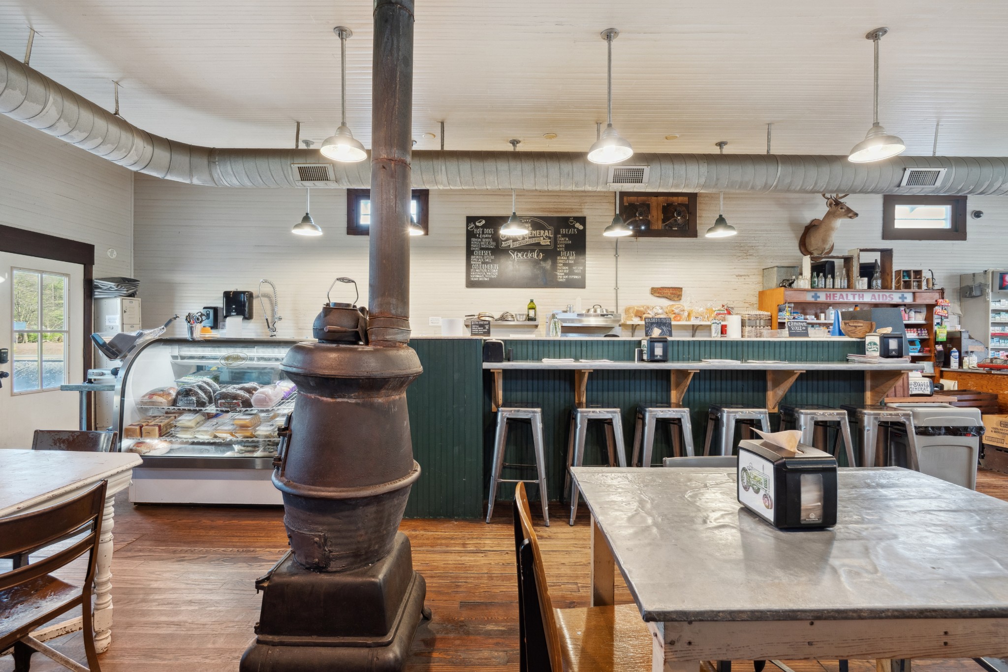5600 Leipers Creek Road Franklin, TN 37064 - Photo 13 of 39 a kitchen with stainless steel appliances granite countertop a sink counter space and stove top oven