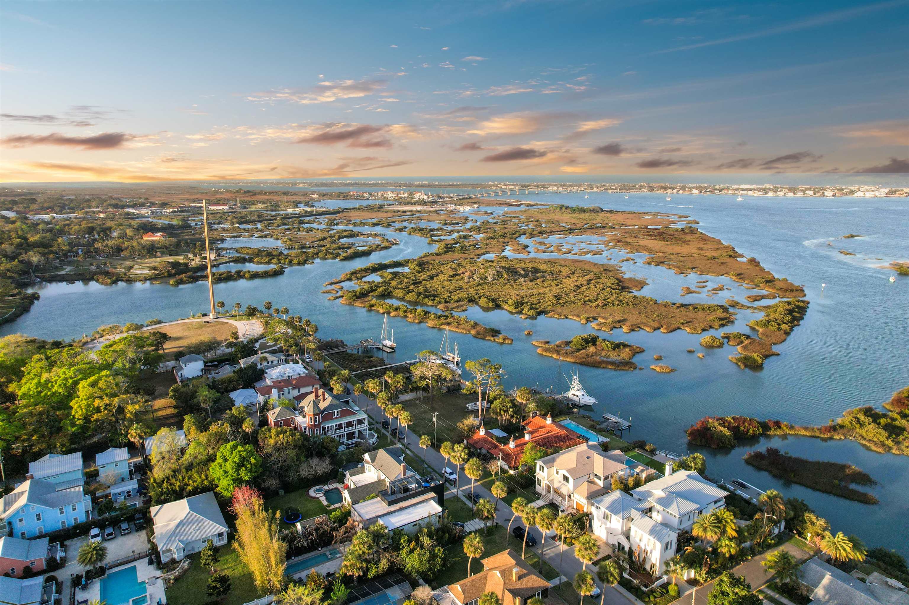 71 Water Street St. Augustine, FL 32084 - Photo 56 of 57 Aerial perspective of suburban area featuring a nearby body of water