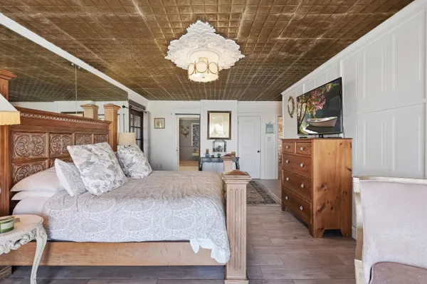 a kitchen with stainless steel appliances granite countertop a stove a sink dishwasher and a refrigerator