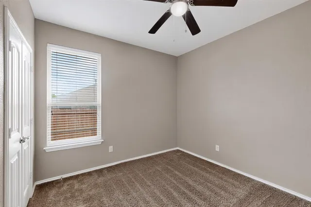 a view of an empty room with window